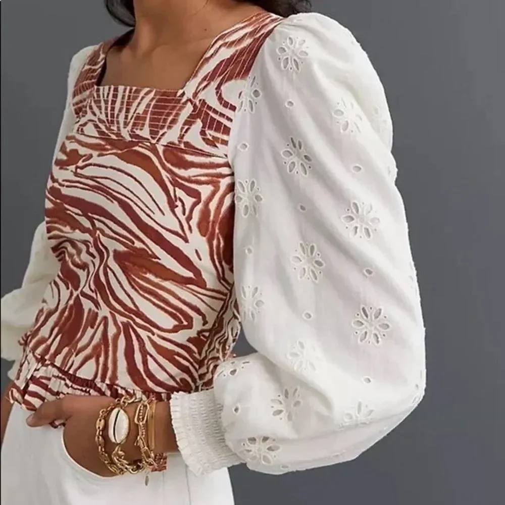 Anthropologie love the label Zebra Print Eyelet Puff sleeve smocked blouse S EUC